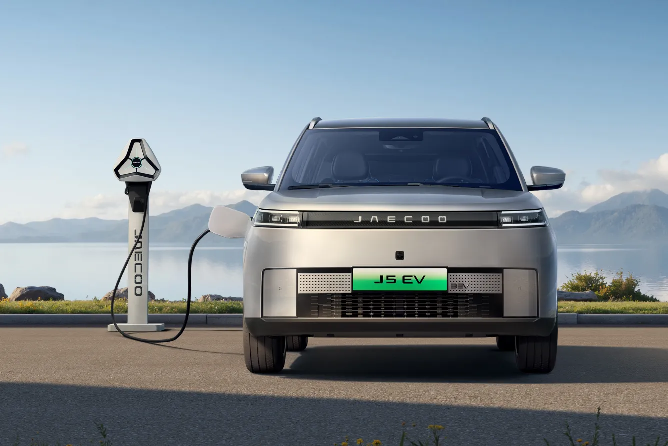 JAECOO J5 EV charging beside a lake